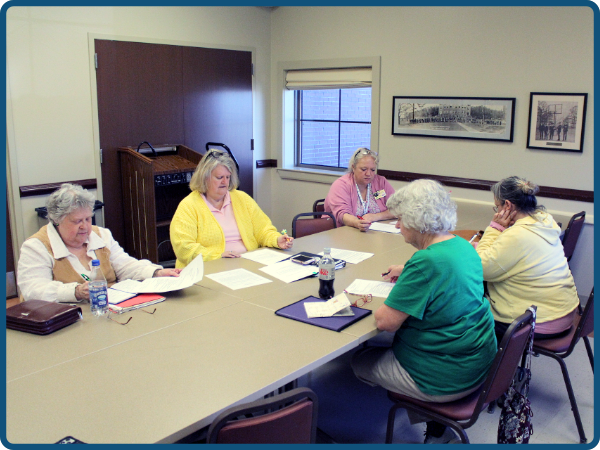 Several Friends of the Library at work.