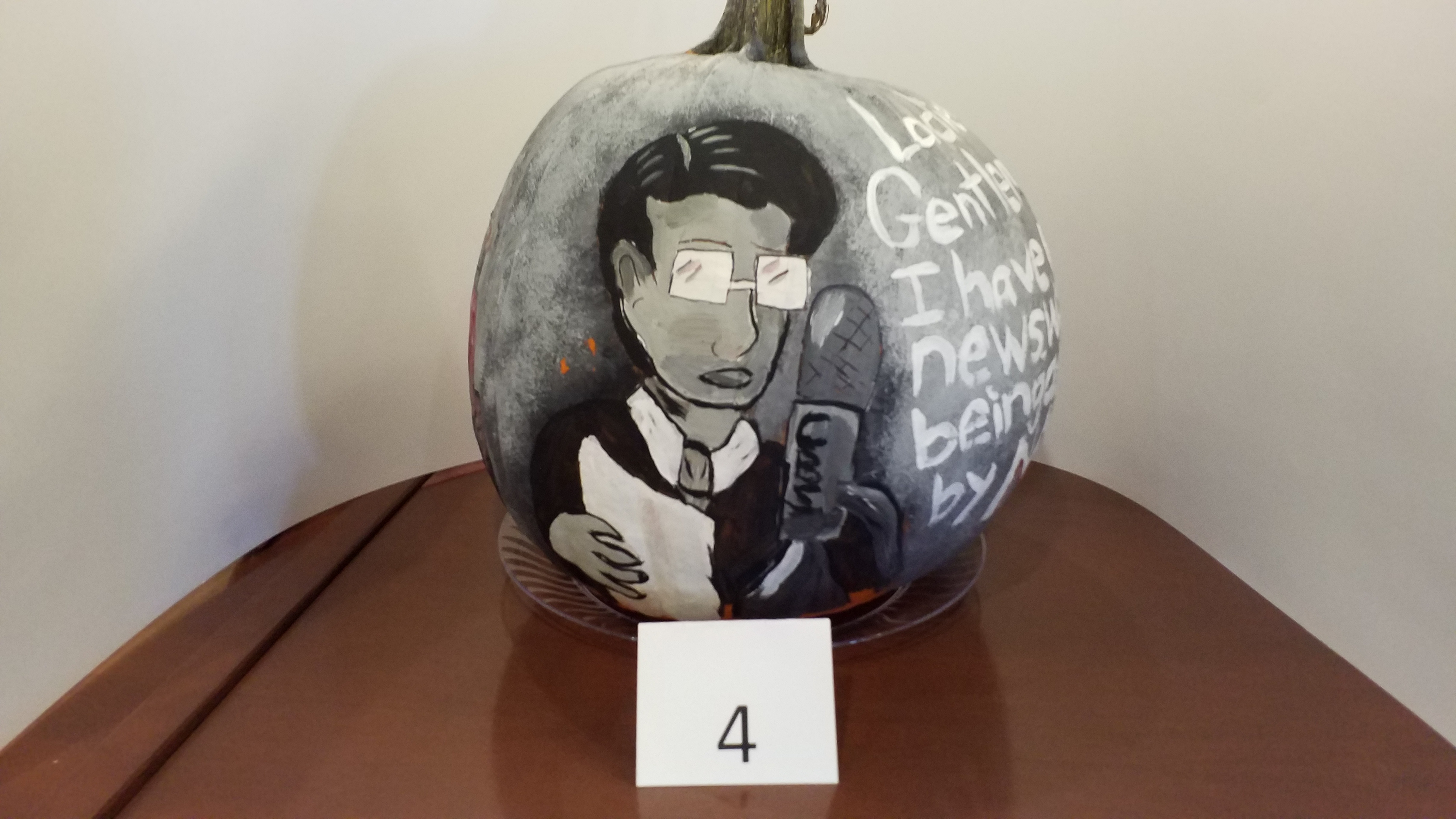 Pumpkins decorated as "War of the Worlds"