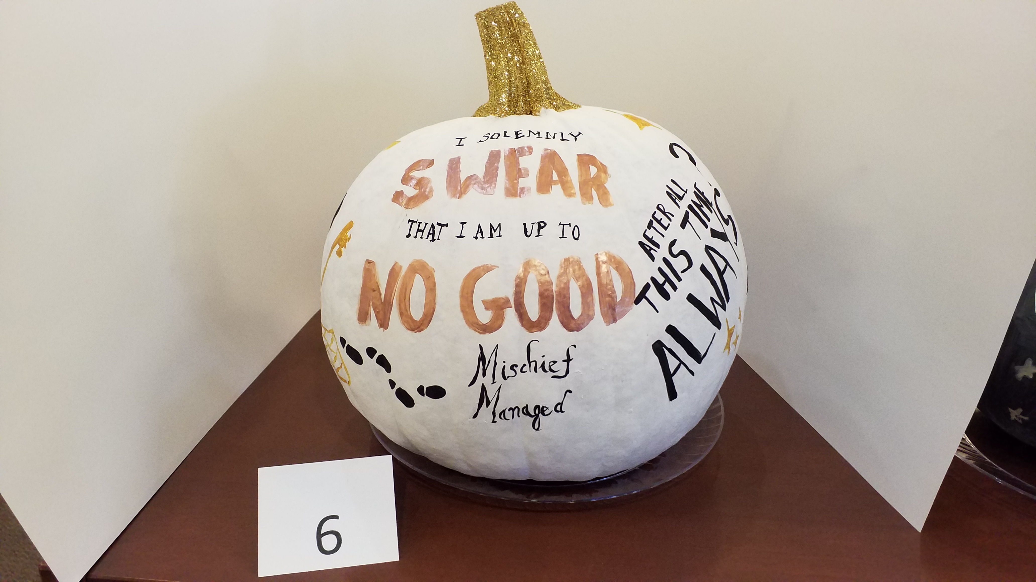 Pumpkin decorated with quotes from "Harry Potter"