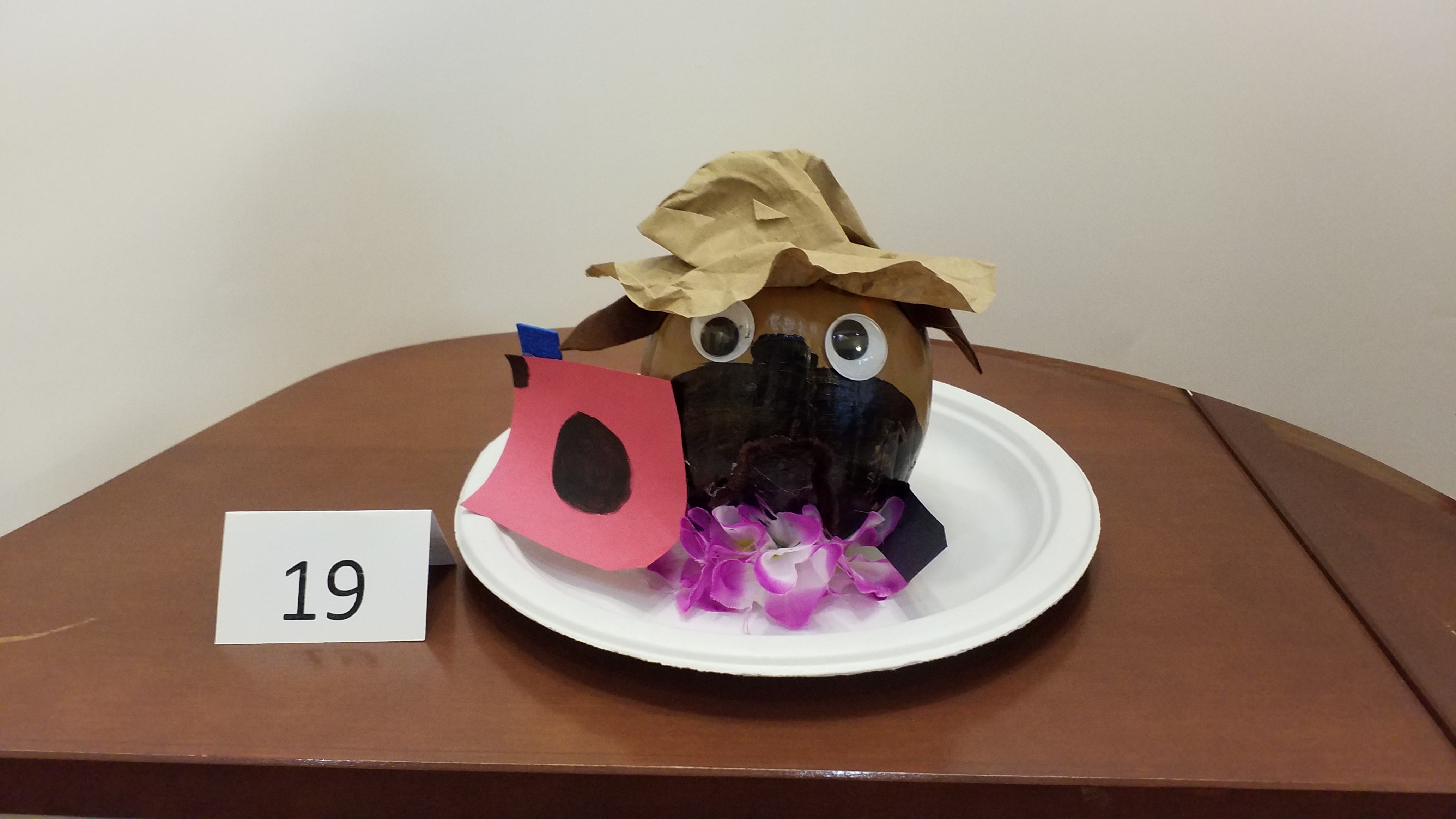 Pumpkin decorated as friendly pug dog