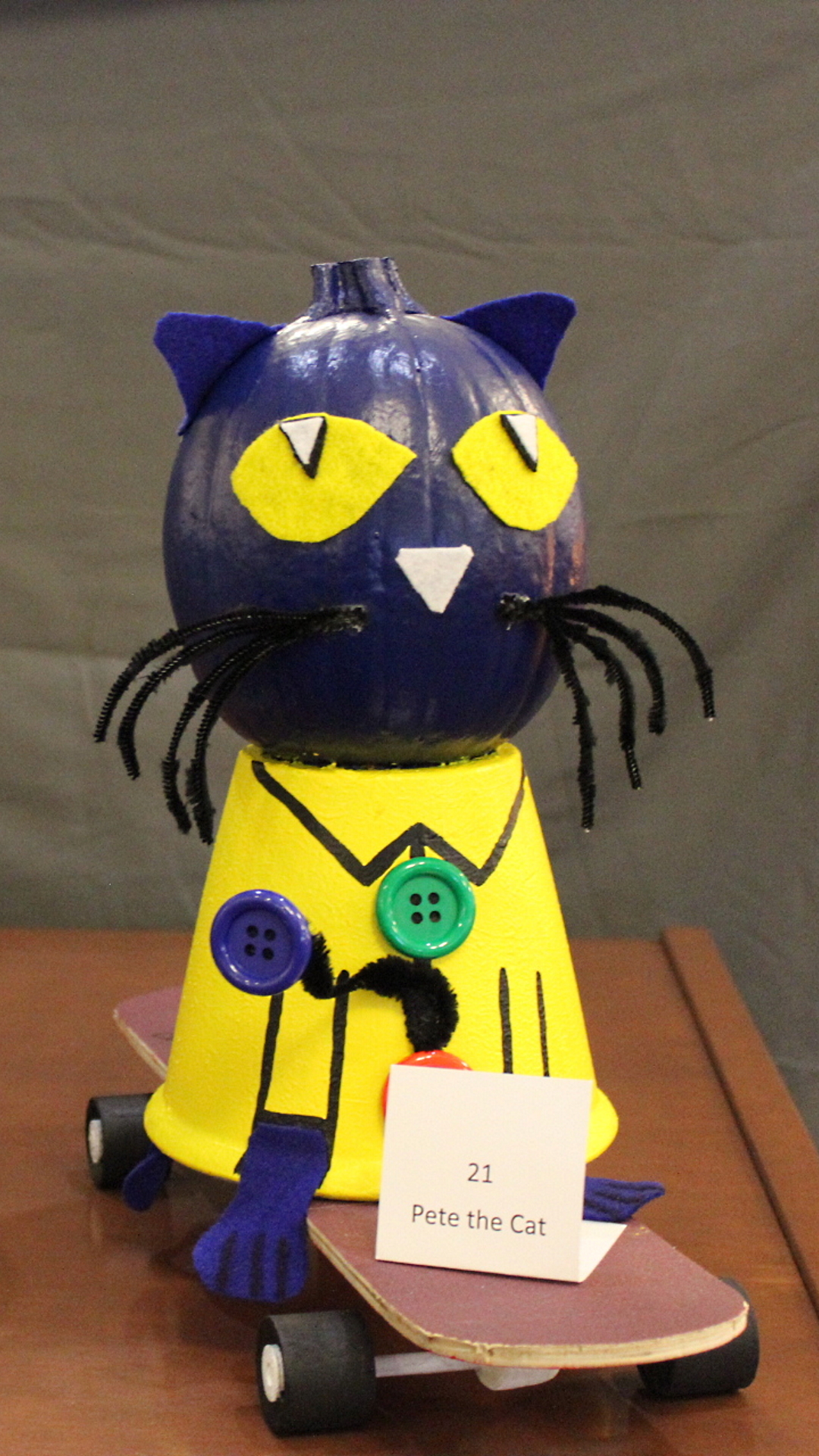 Pumpkin decorated as Pete the Cat on skateboard