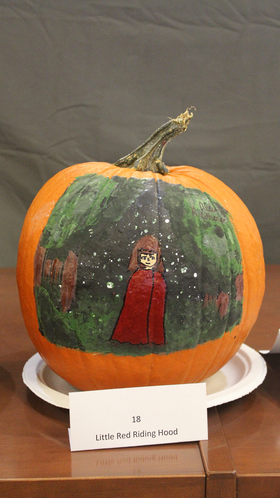 Pumpkin decorated as "Little Red Riding Hood"