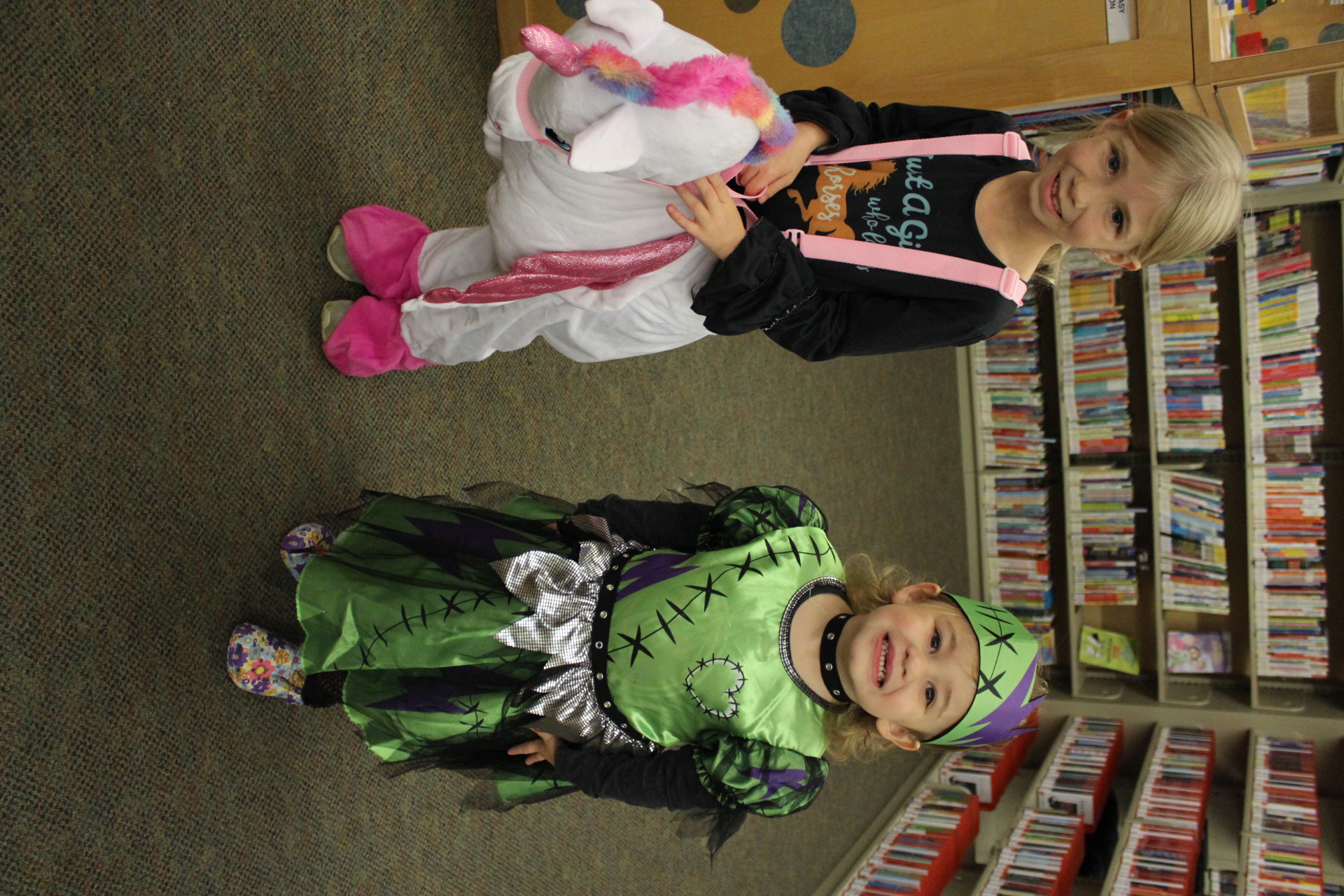 Children dressed as unicorn and Frankenstein's monster