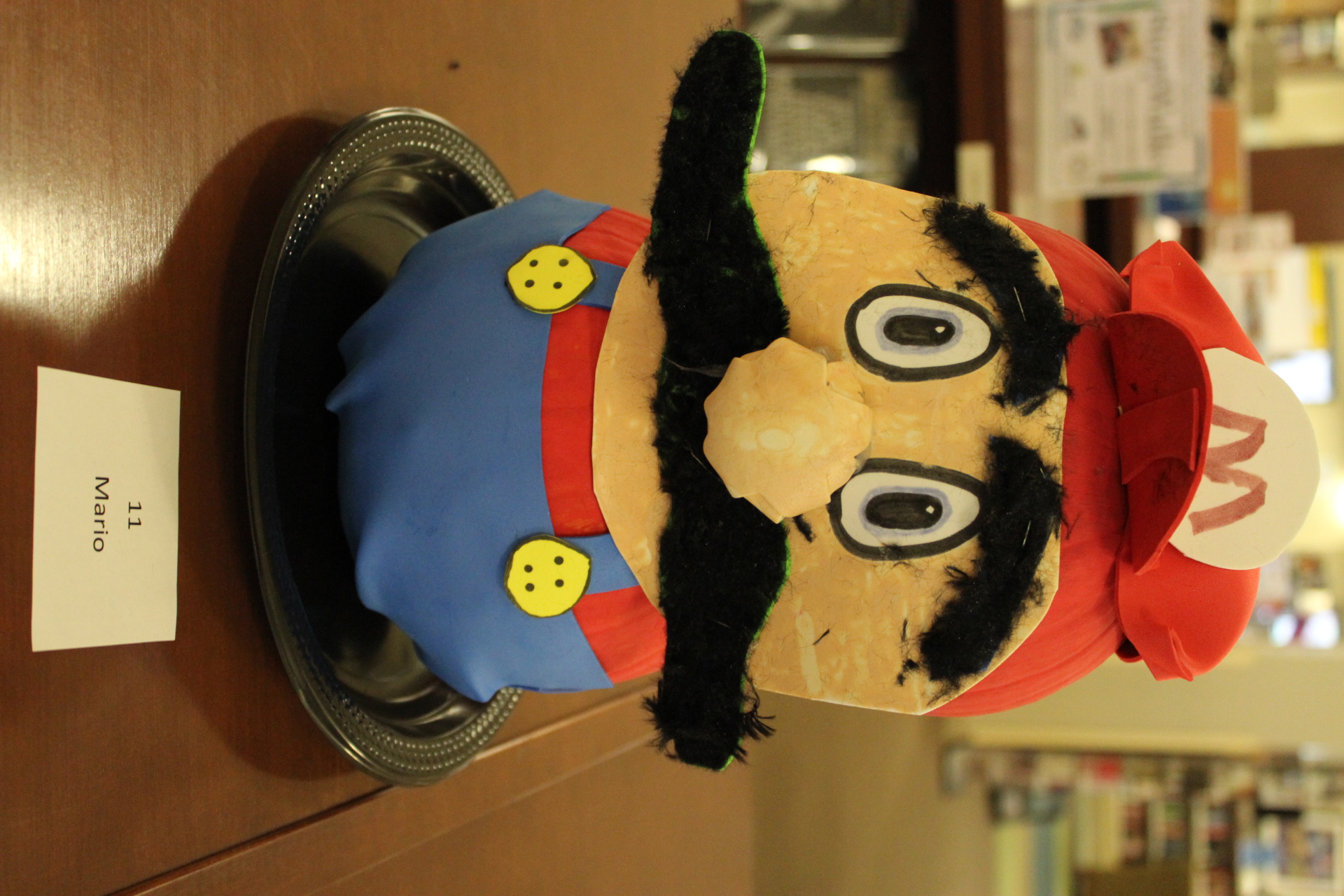 Pumpkin decorated as "Super Mario"