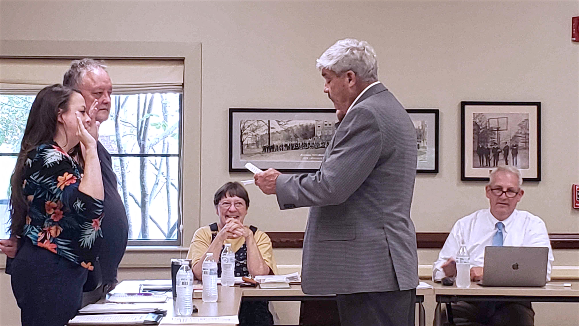 Rowan County Judge-Executive Harry Clark administering the oath of office to new board members Doctor Shana Savard-Hogge and Drew Henderson with current board members Deborah Howes and Jason Slone seated in background