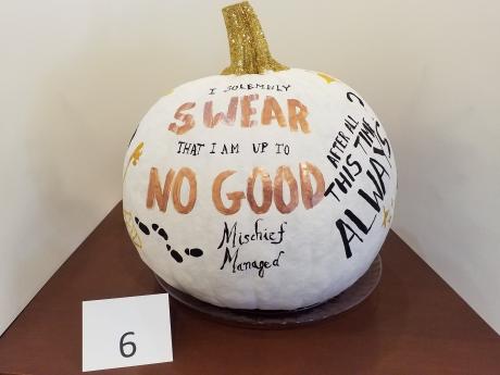 Pumpkin decorated with quotes from "Harry Potter"